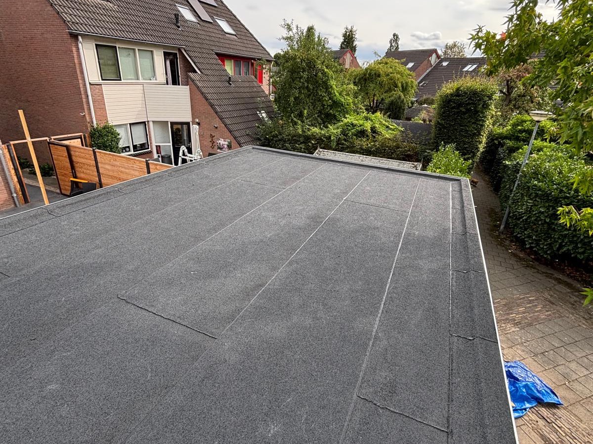 Na: Plat dak renovatie woning